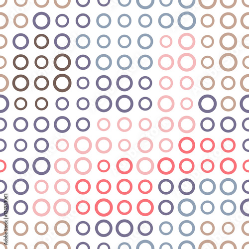 Seamless pattern of rings on a white background.