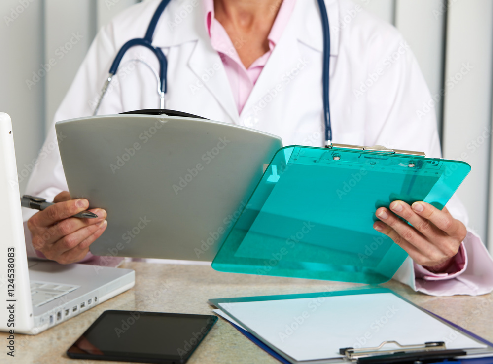 Doctor woman working in clinic. Doctor woman working in clinic.