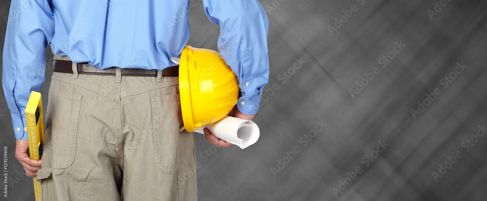 Engineer with helmet and blueprint. Engineer with helmet and blueprint.