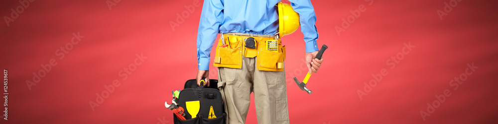 Construction worker with helmet and hammer. Construction worker with helmet and hammer.