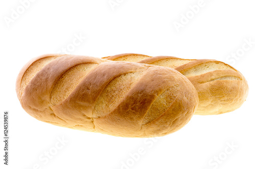 Long loaf bread isolated on white.