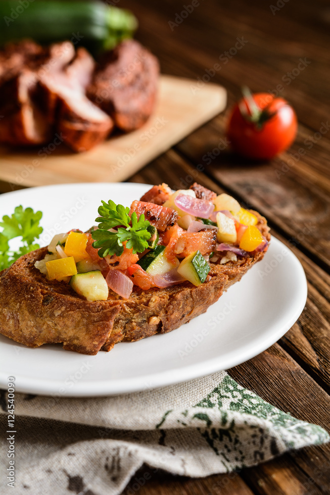 Bruschetta with tomato, pepper, onion and bacon Bruschetta with tomato, pepper, onion and bacon