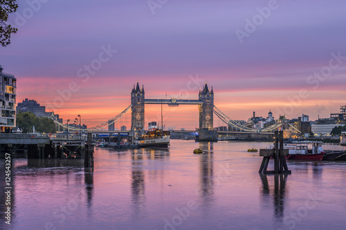 Famous Tower Bridge in front of colorful sky at morning before sunrise, London, England, United Kingdom