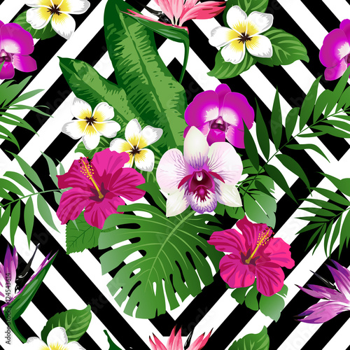 Fototapeta Naklejka Na Ścianę i Meble -  Tropical flowers and leaves on background. Seamless. Vector. 