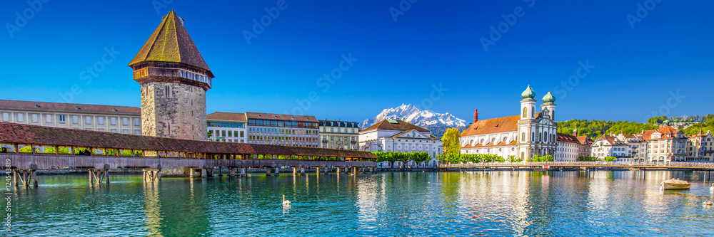 Historic center of Lucerne with chapel bridge, water tower and Pilatus mountain in background, Switzerland, Europe