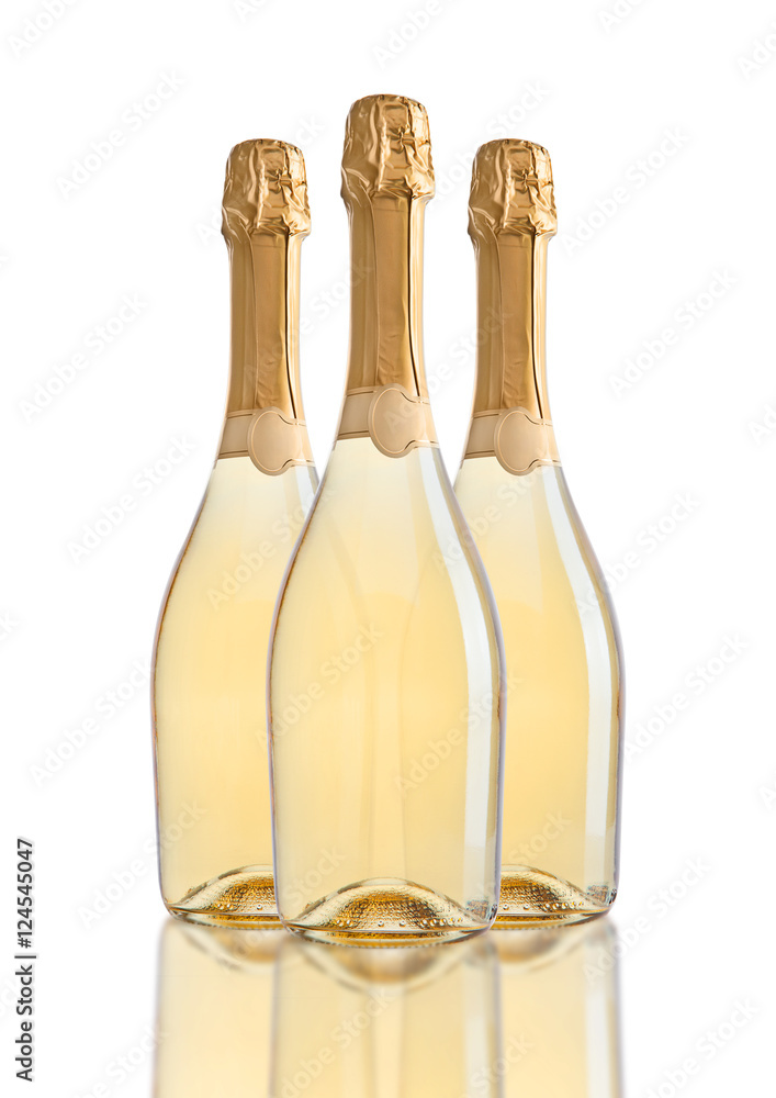 Bottles of champagne golden yellow color on white Stock Photo | Adobe Stock