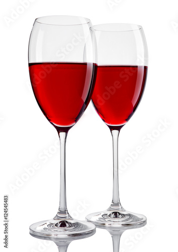 Two glasses of red wine on white