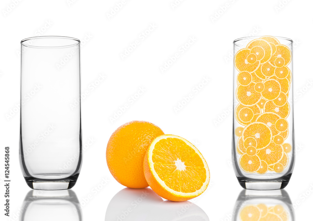 Glass of healthy organic oranges inside on white Glass of healthy organic oranges inside on white