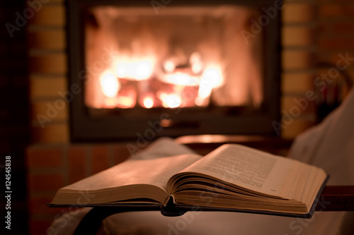 Open book by the Fireplace
