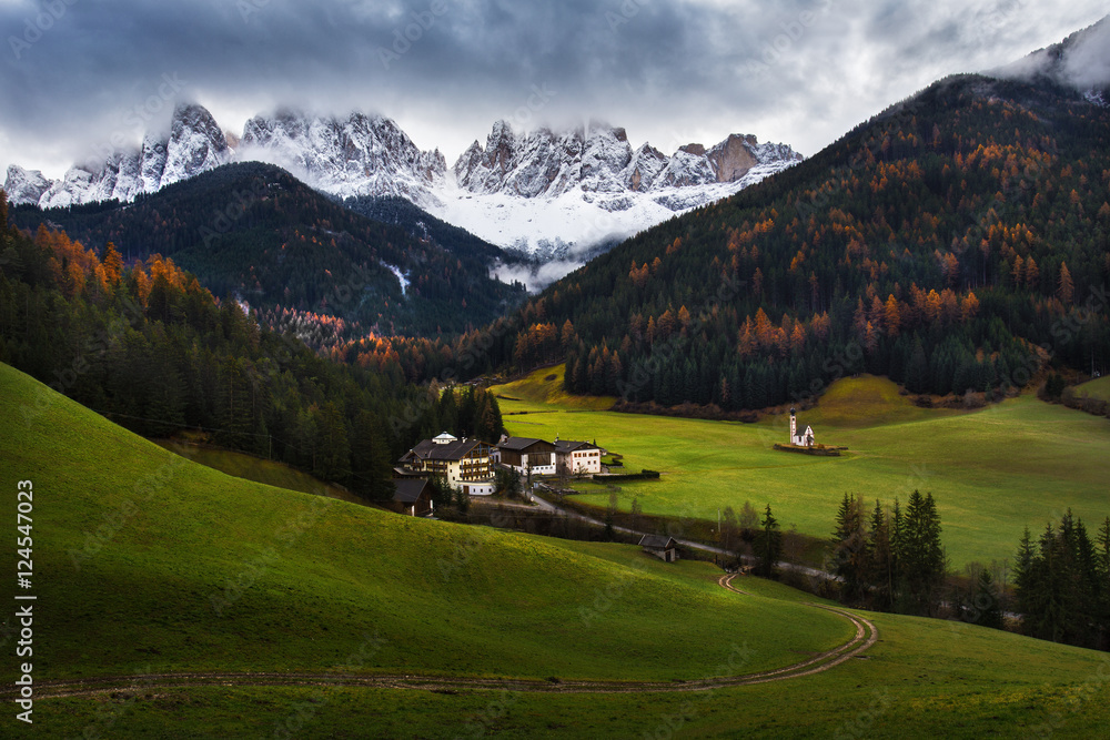 St Johann Church in front of the Geisler or Odle Dolomites Group, Val di Funes, Santa Maddalena, Italy