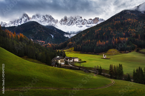 St Johann Church in front of the Geisler or Odle Dolomites Group, Val di Funes, Santa Maddalena, Italy