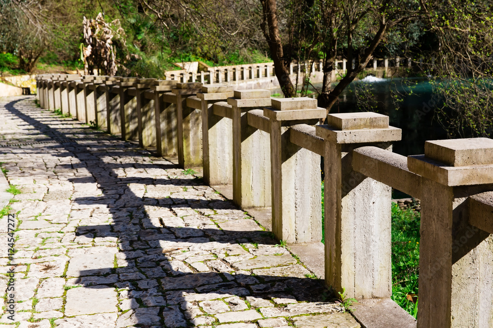 Ancient stone promenade with stone railing in New Athos Abkhazia Ancient stone promenade with stone railing in New Athos Abkhazia
