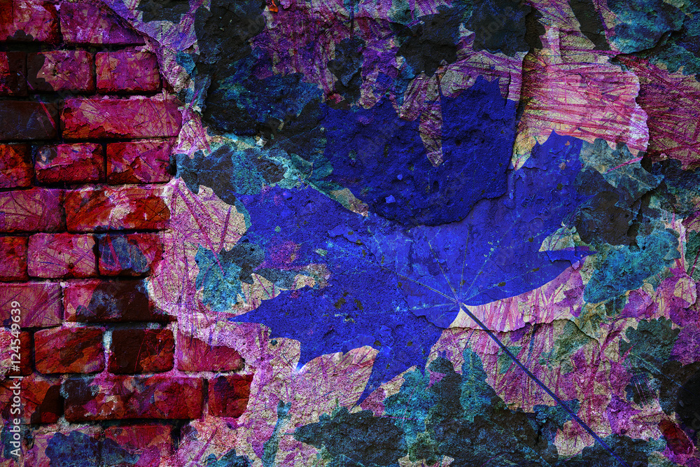 Abstract colorful wallpaper. double exposure brickwork and maple leaf. Abstract creative background