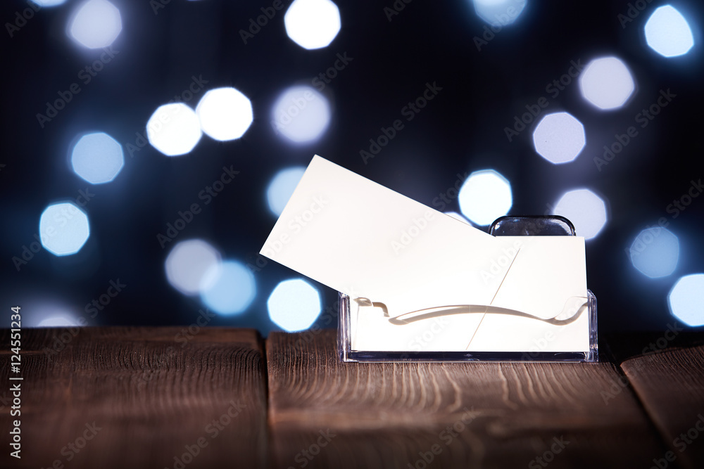 Obraz premium Professional blank business card in holder.