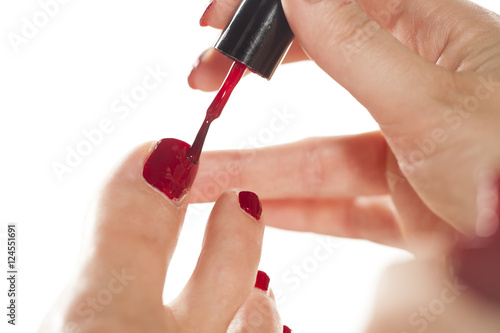  women applied nail polish on her toes