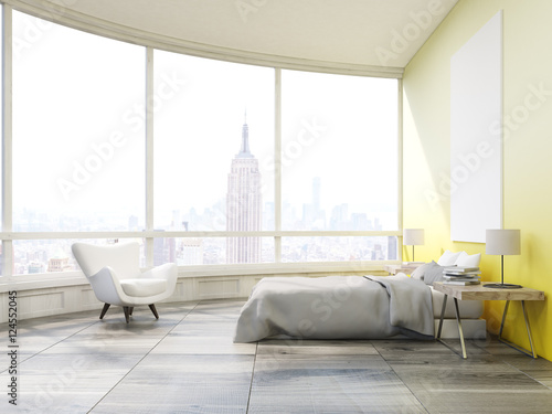 Side view of bedroom with yellow walls in New York