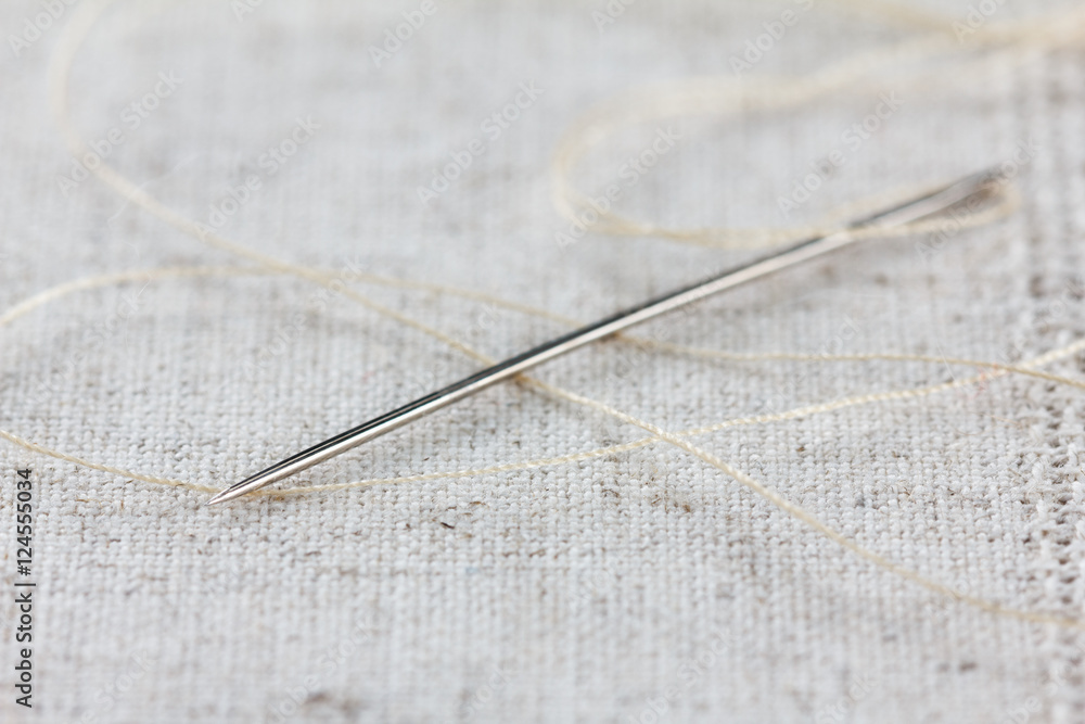 Lien fabric with needle and thread Lien fabric with needle and thread