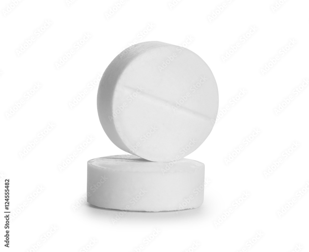 close-up of two pills isolated on white background close-up of two pills isolated on white background