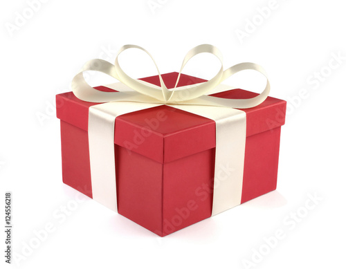 Red gift box with white satin ribbon and bow isolated on white background