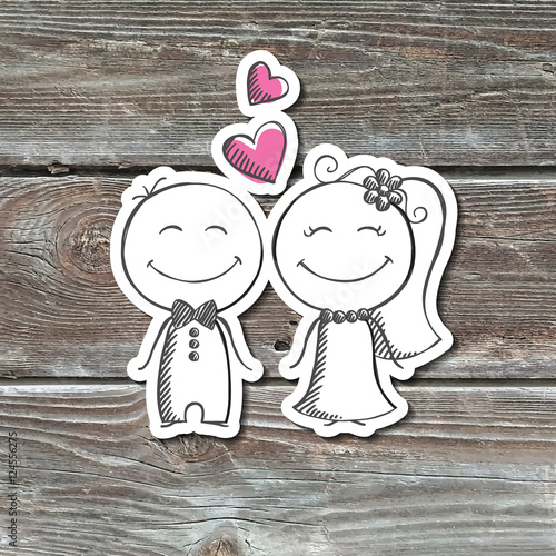 hand drawn wedding couple, groom and bride, paper sticker on realistic wood texture photo