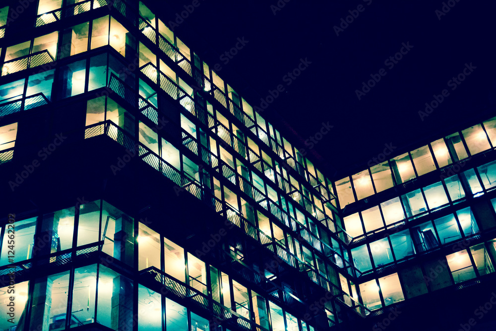 City lights. Abstract architectural concept. Developing construction site lights at night. Developer, residential construction and urban living and lifestyle concept. City lights. Abstract architectural concept. Developing construction site lights at night. Developer, residential construction and urban living and lifestyle concept.