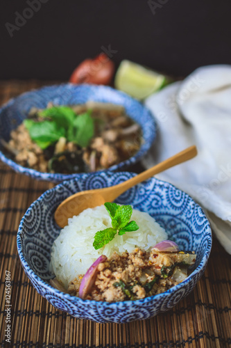 Thai Spicy Minced Pork on Wood Background, Thai Food on Wood Bac