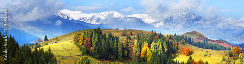 Autumn and winter in the mountains photo