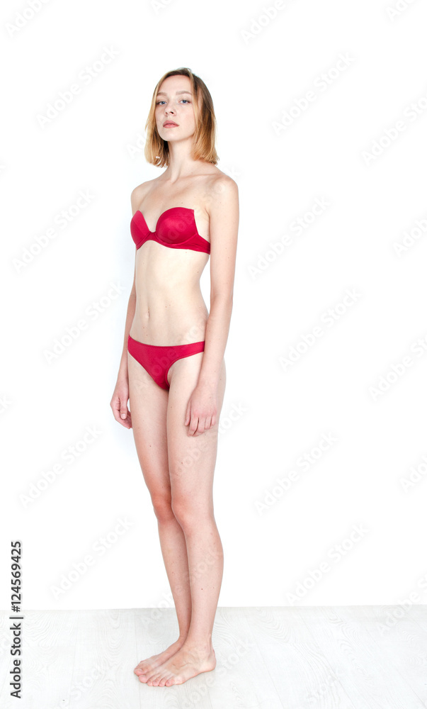 Obraz premium Standard model tests of young pretty woman on a white background
