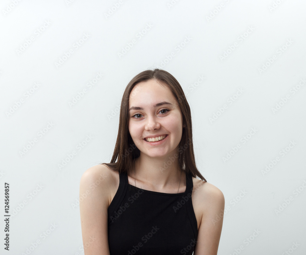 Young woman smiling at camera, portrait. Young woman smiling at camera, portrait.