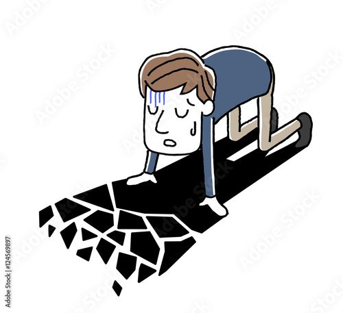 絶望して落ち込む若い男性


