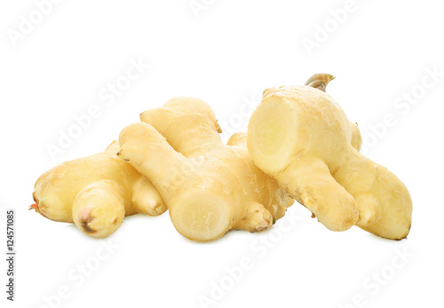 fresh young ginger with slices isolated on white