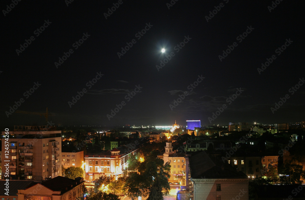 Krasnodar, Russia, at night with moon in the sky Krasnodar, Russia, at night with moon in the sky