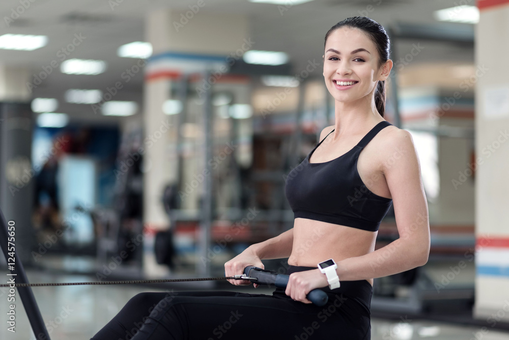 Smiling girl having a workout Smiling girl having a workout