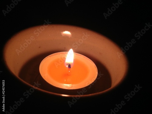 Candlelight in cup at the dark for Halloween.