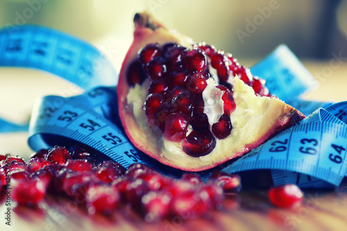 diet mesaure fruit red pomegranate photo