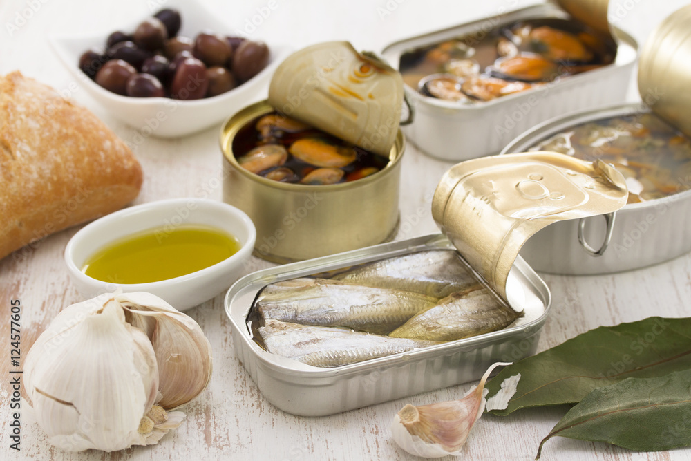 seafood in iron box on wooden background seafood in iron box on wooden background