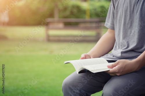 Man reading in the park.