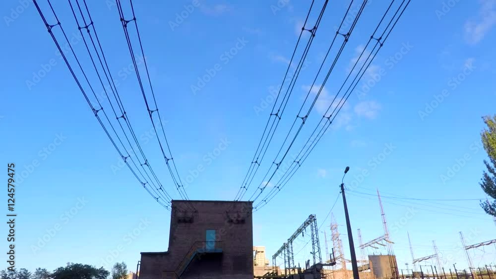 The clouds fly over the power substation . Time lapse. Power Line Transformer The clouds fly over the power substation . Time lapse. Power Line Transformer