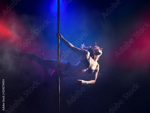 Tableau sur toile Female striptease on the pole