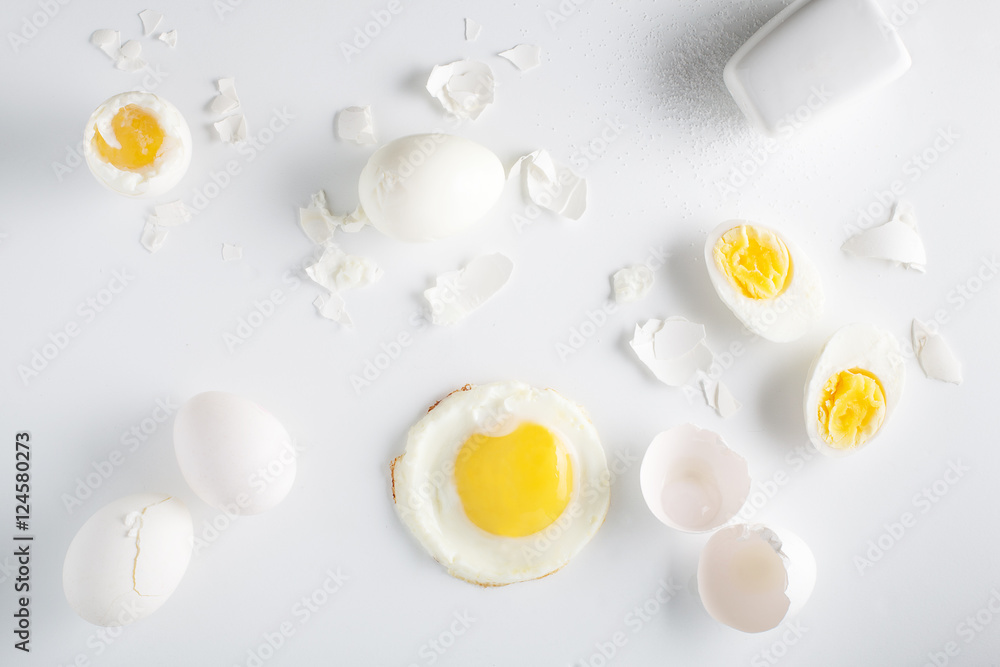 Eggs on white background. Overhead view Eggs on white background. Overhead view