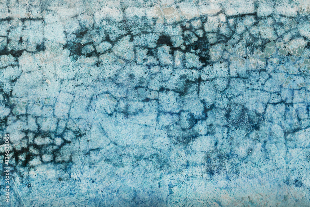 Fototapeta premium Abstract blue tone cement floor crack pattern background