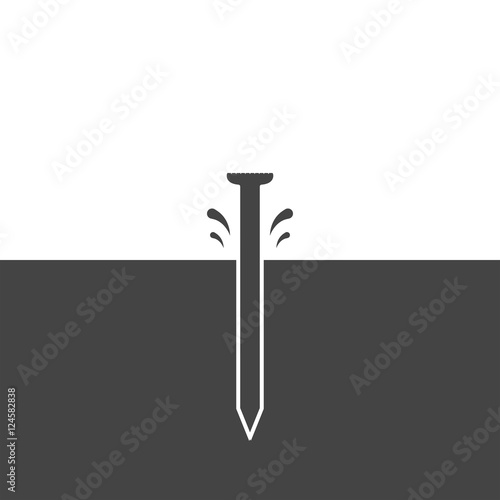 Nail hammered into the surface