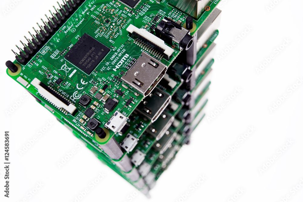 Six circuit boards lying on each other on black reflective backg Six circuit boards lying on each other on black reflective backg