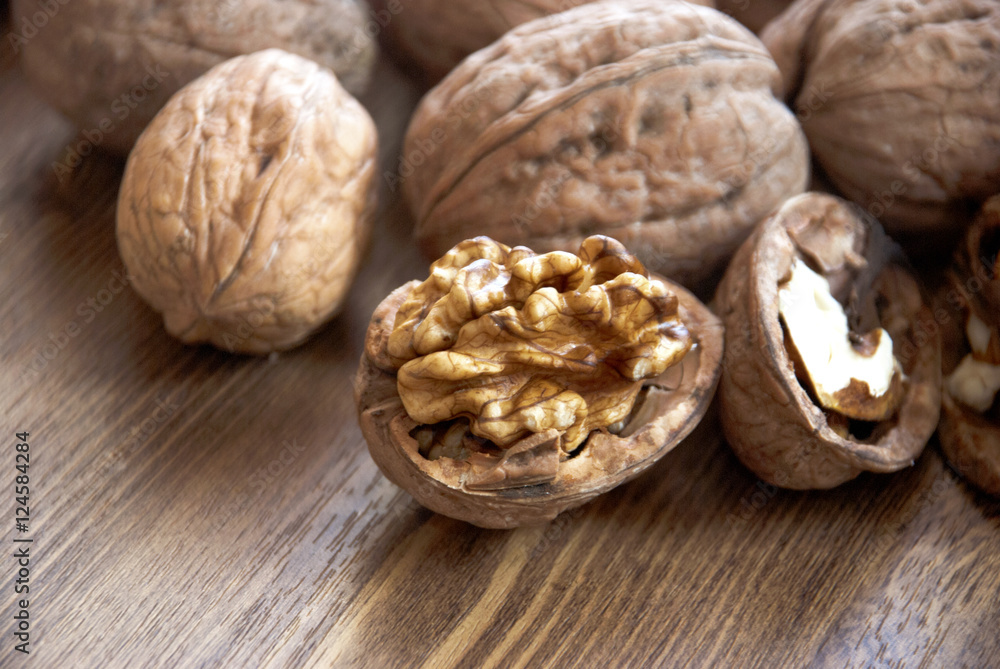 walnuts on the wooden-table.Walnut, Nut - Food, Variation, Food, Seed walnuts on the wooden-table.Walnut, Nut - Food, Variation, Food, Seed
