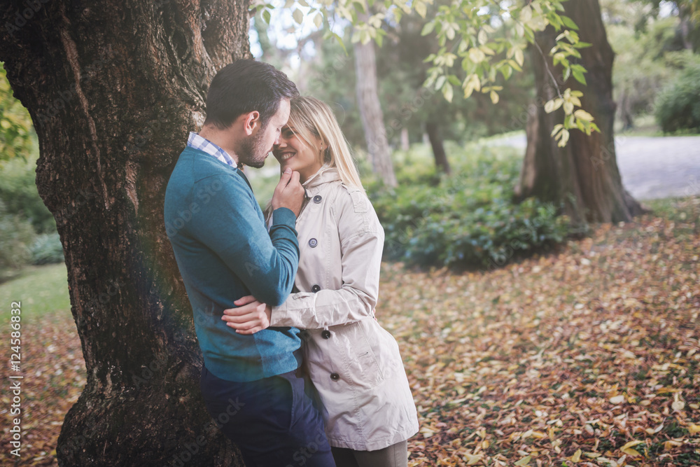 Loving couple walking in park Loving couple walking in park