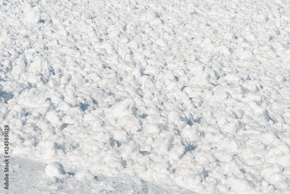 Avalanche ski run slope boulders covered