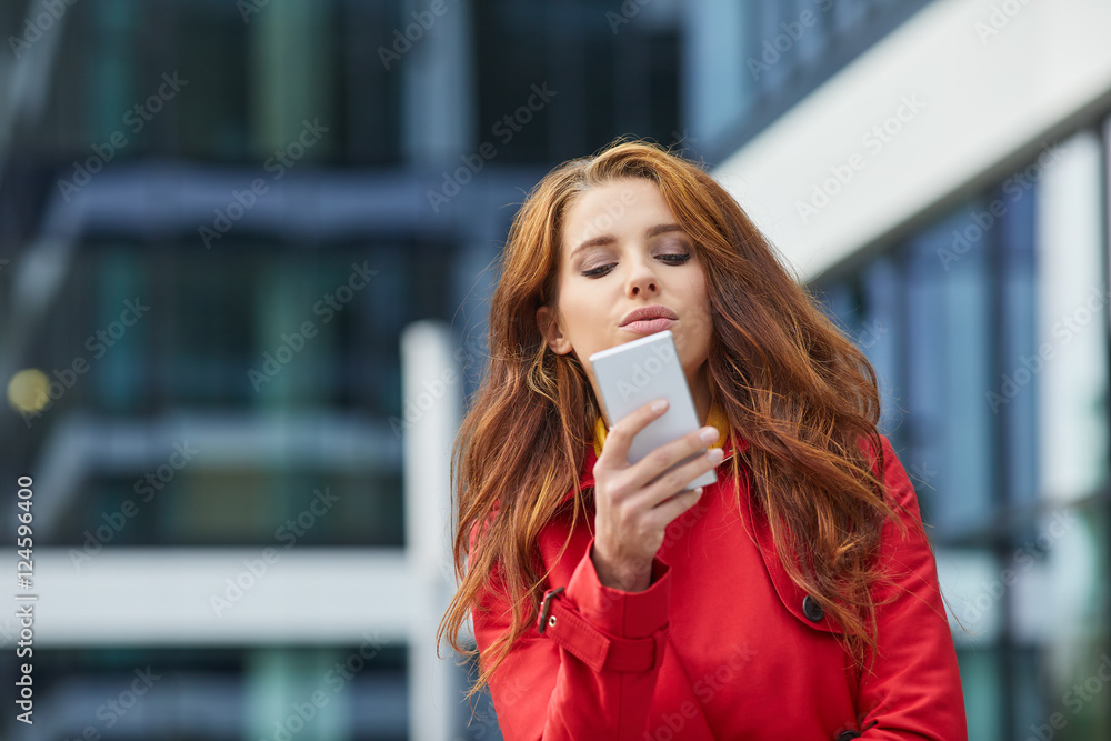 custom made wallpaper toronto digitalPortrait of young brunette woman in beige coat talking on the ph