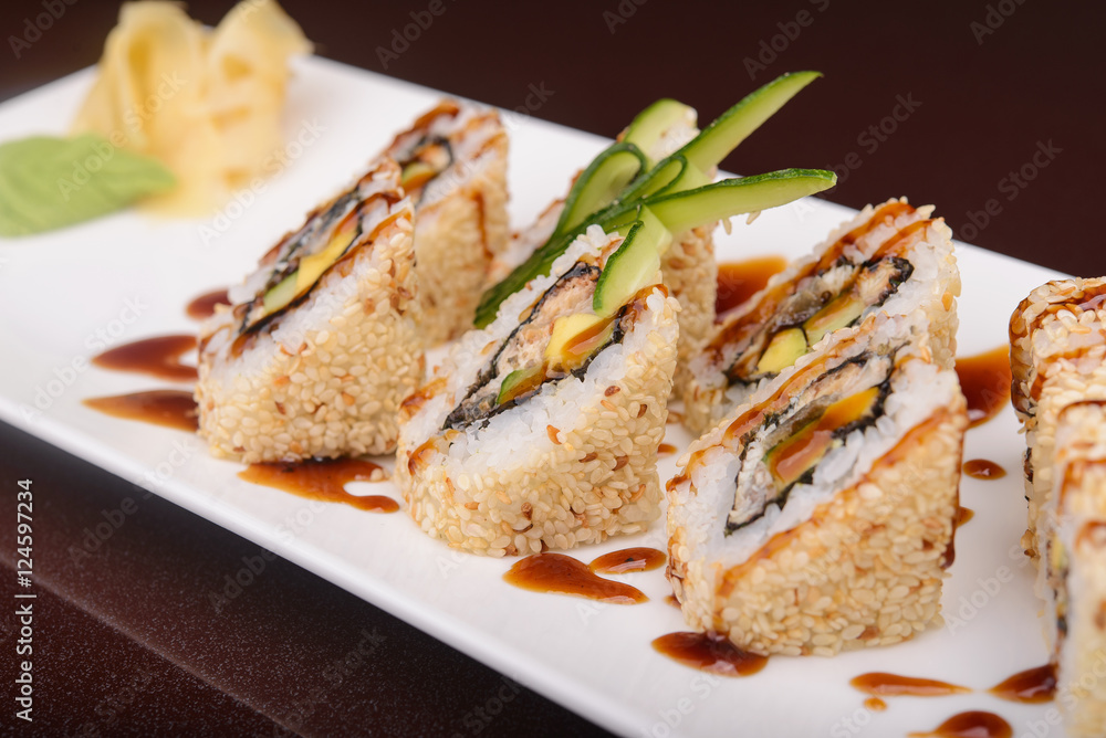 Sushi rolls on a white plate Sushi rolls on a white plate