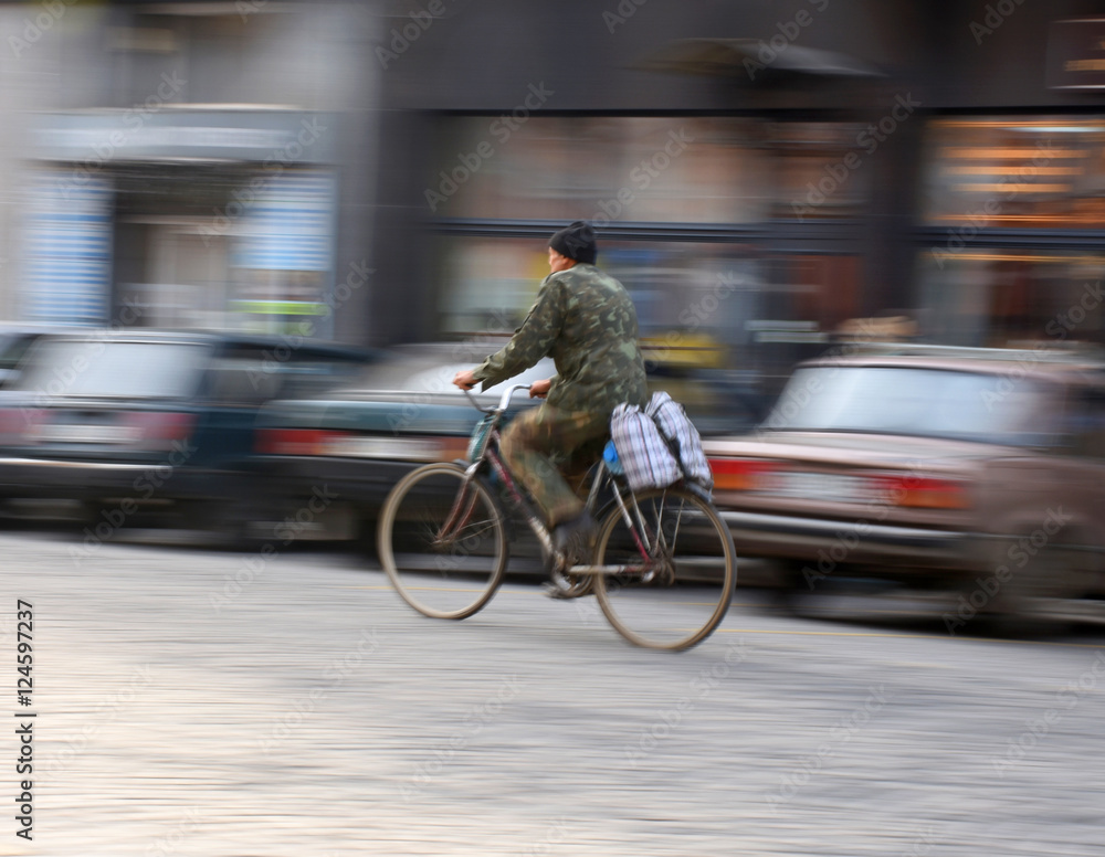 Cyclist on the city roadway Cyclist on the city roadway