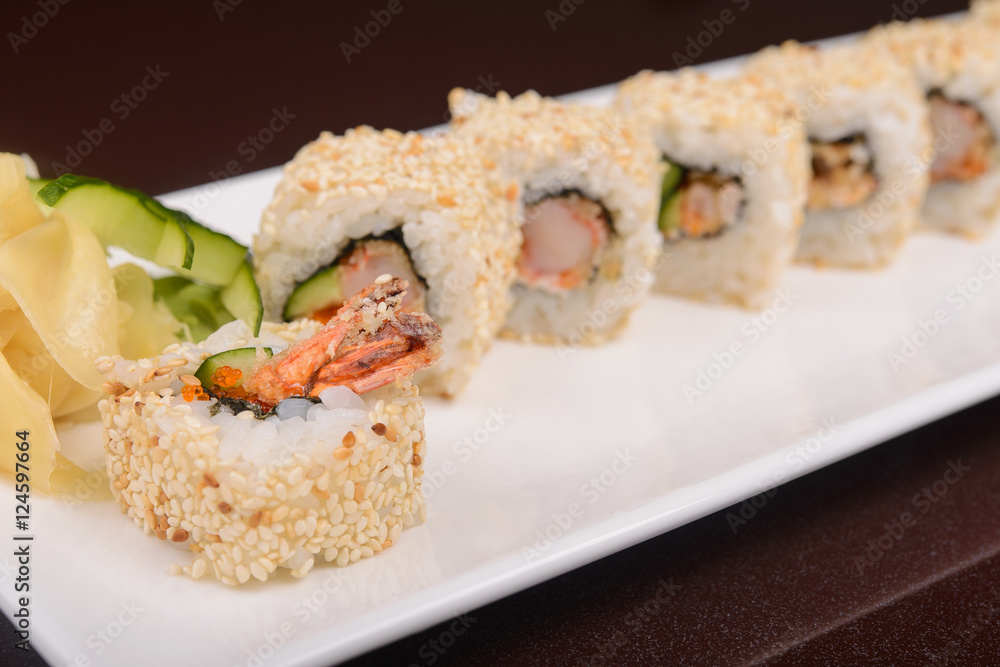Sushi rolls on a white plate Sushi rolls on a white plate